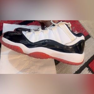 Air Jordan 11 Retro Low GS Concord-Bred size 4 red white and black.